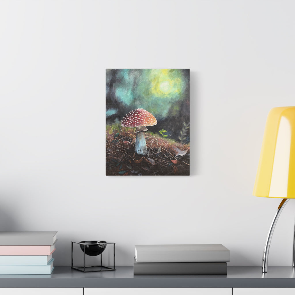 Canvas print of a mushroom painting on a wall above a desk with books and a lamp.