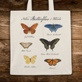 Tote bag with illustrations of butterflies of Florida on a wooden surface