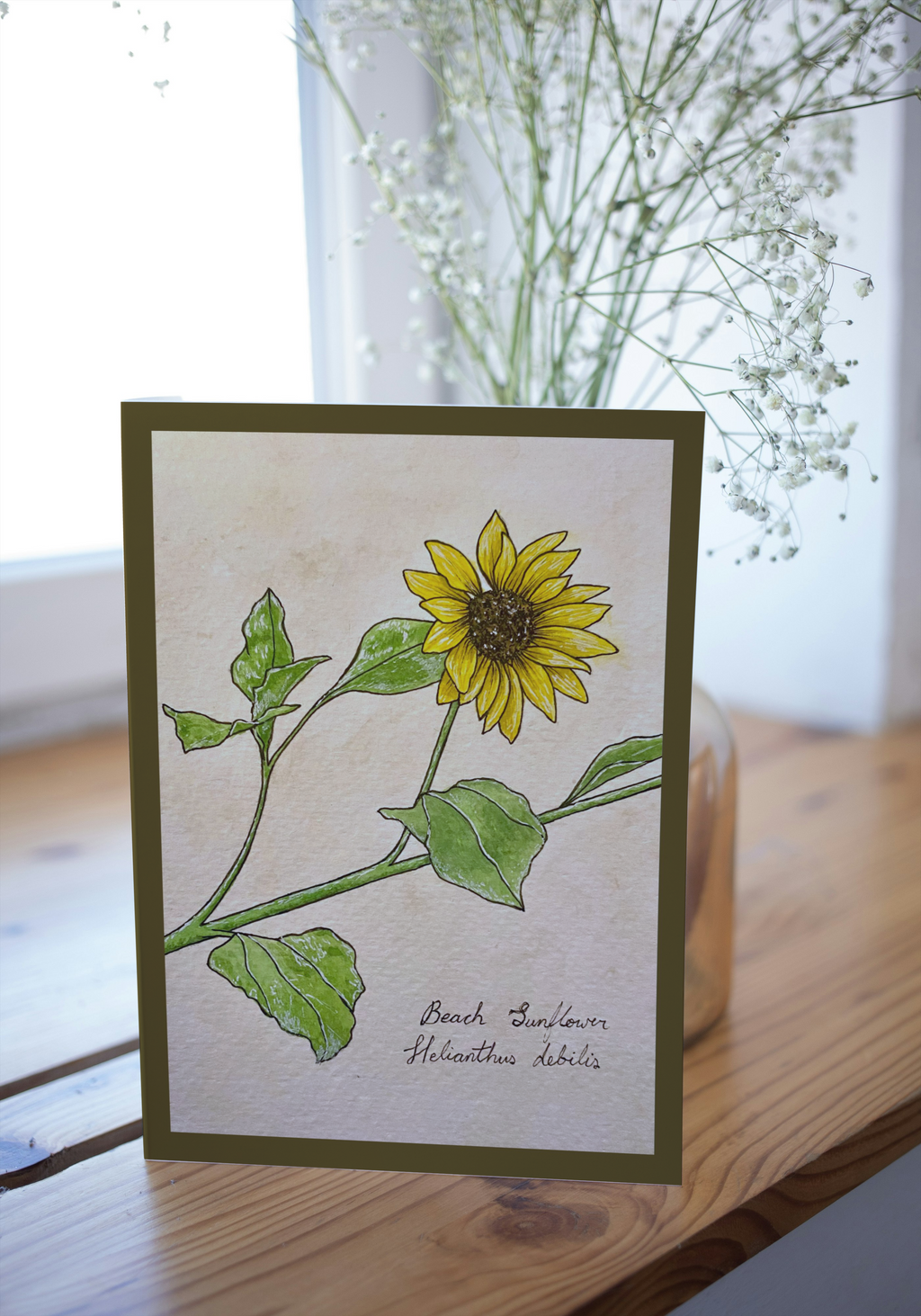Greeting card on wood surface with blurred background