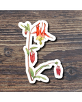 Floral stcker on a wood surface
